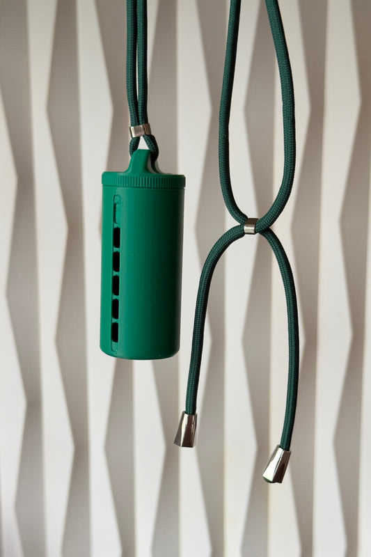 „Mean Green” Münzhalter mit luxuriösem Schlüsselband